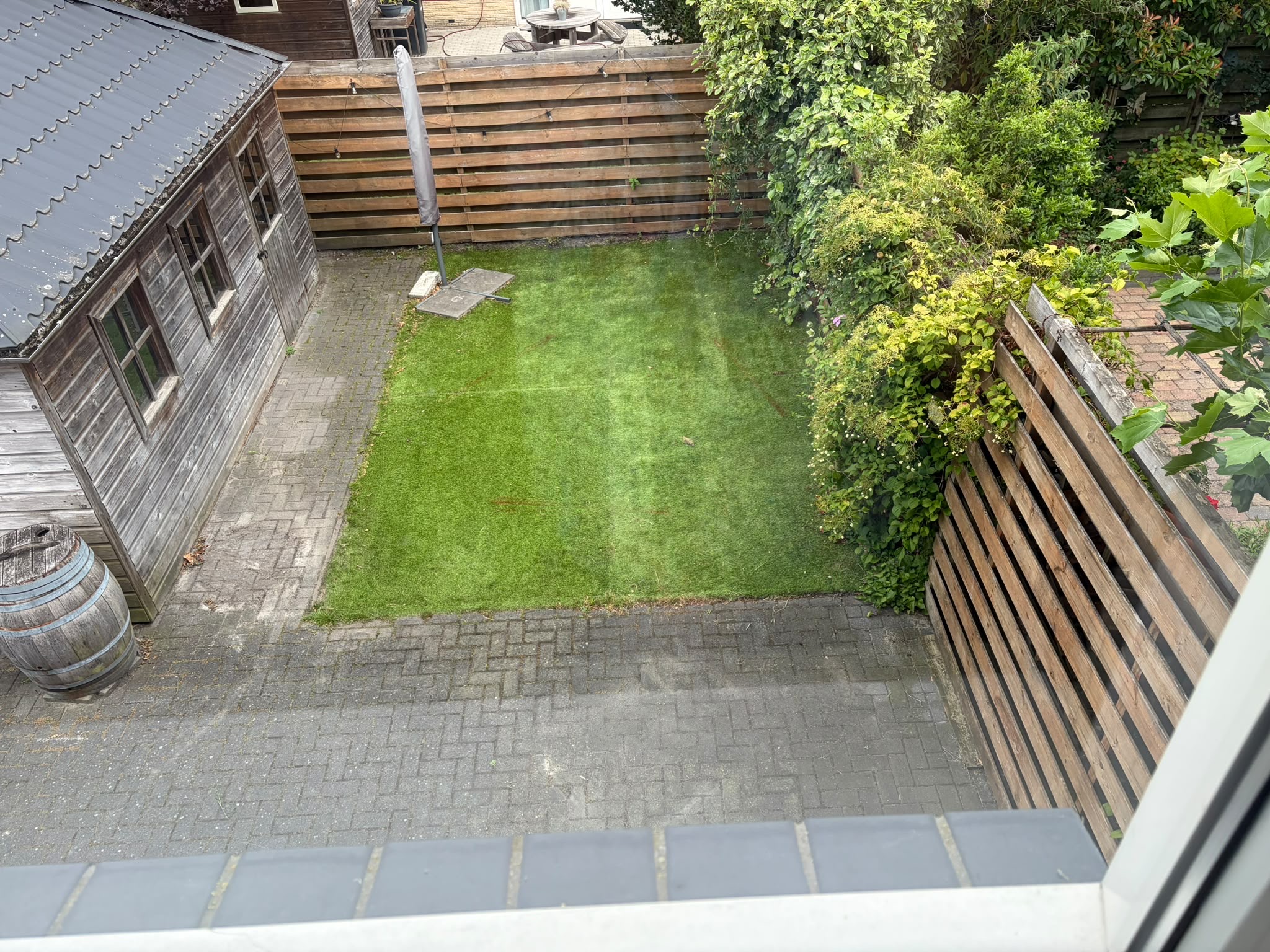 Tuin, bovenaanzicht met berging